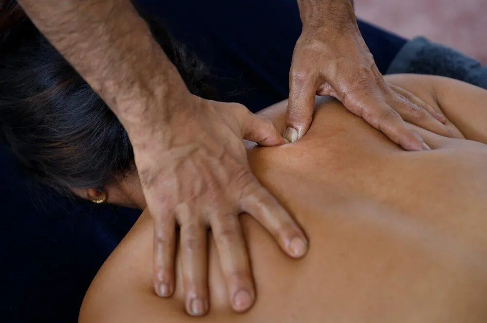 A female getting a deep tissue massage in Lalitpur at Inner Sight